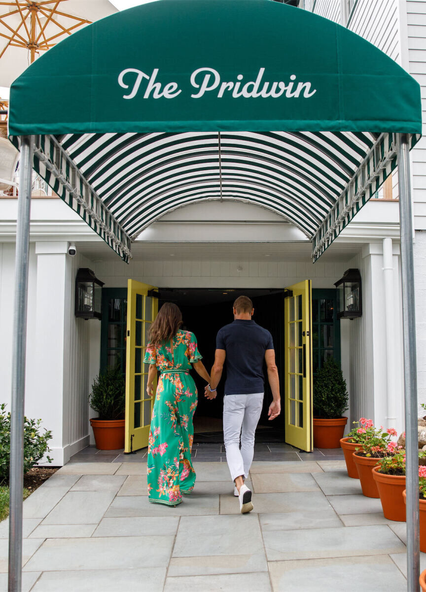 Wedding News: A couple walking into The Pridwin Hotel hand-in-hand.