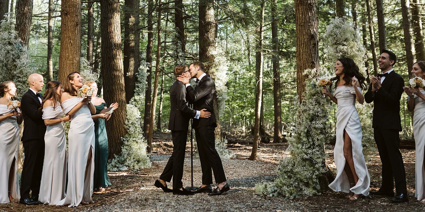 Wedding vendor: Taylor & Jeff's forest wedding ceremony kiss
