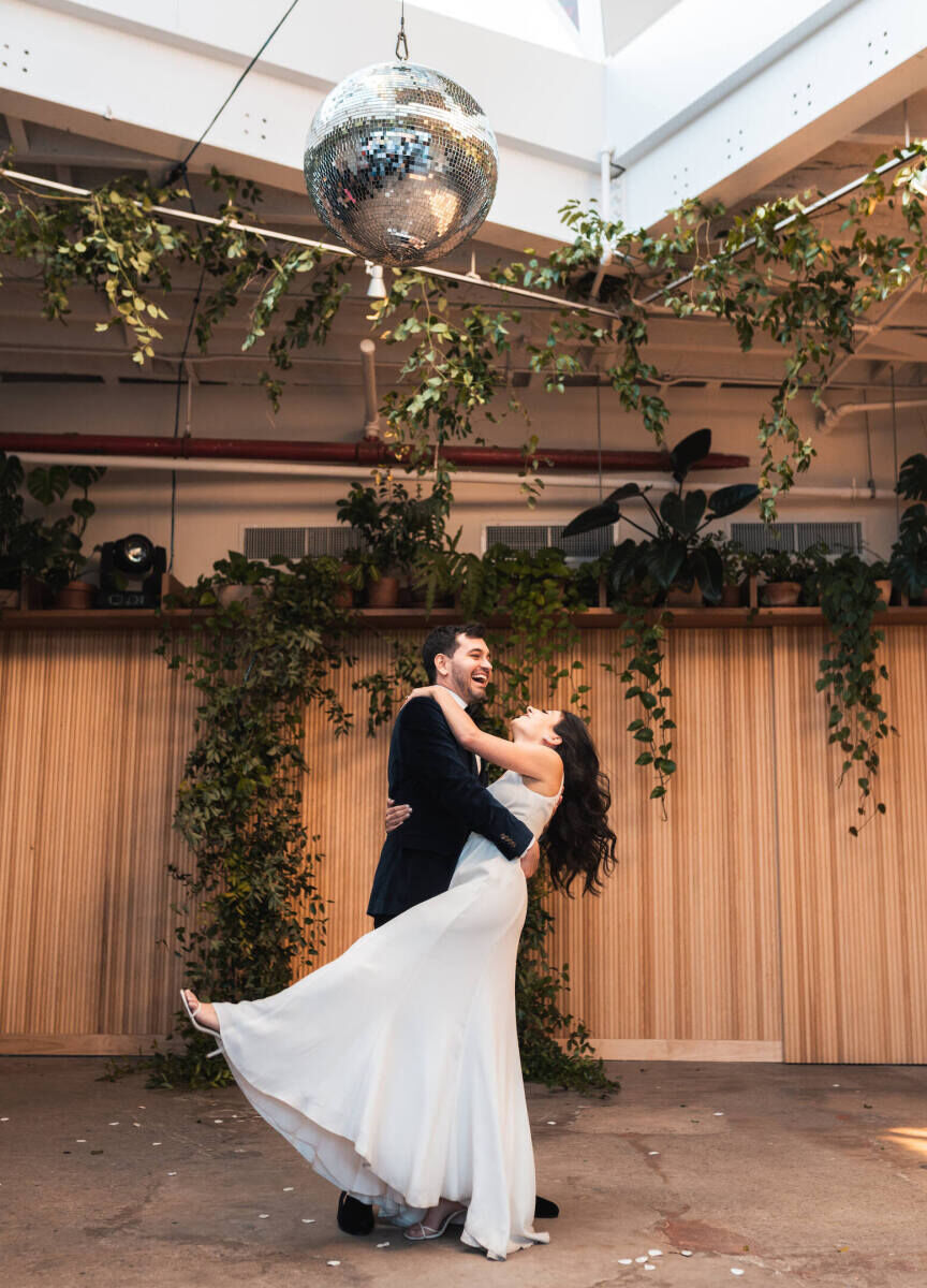 Best Wedding Venues for Creative Couples: A bride and groom dancing happily at Rule of Thirds.