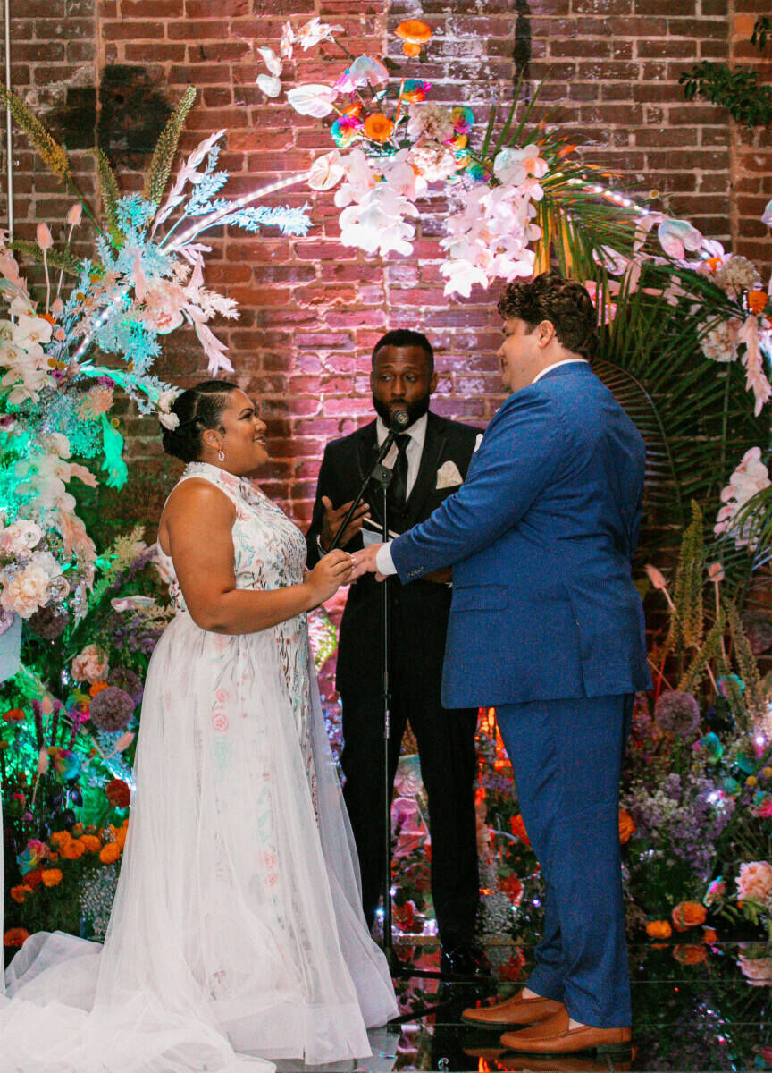 Best Wedding Venues for Creative Couples: A bride and groom during their ceremony at King Plow Arts Center.