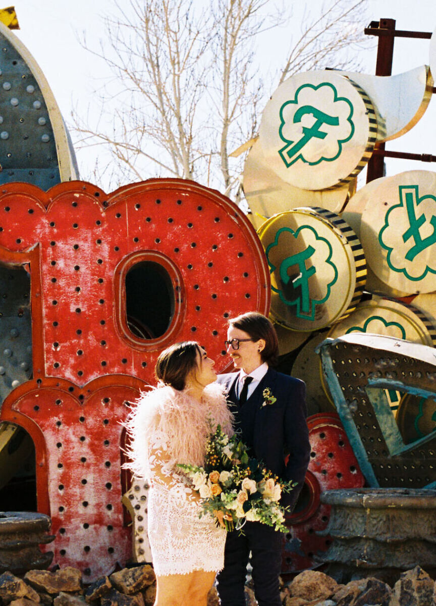 Best Wedding Venues for Creative Couples: A bride and groom at the Neon Museum.