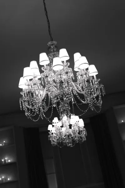 Wedding chandelier showcasing crystal chandelier lighting, adorned with sparkling crystal beads, illuminating an elegant reception.