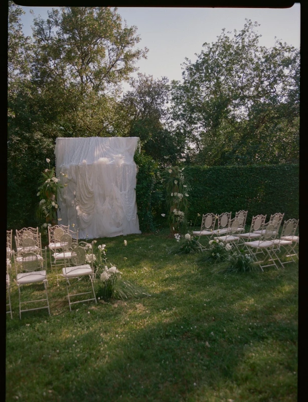 A French Château Wedding Draped, Pooled and Sculpted in Ivory