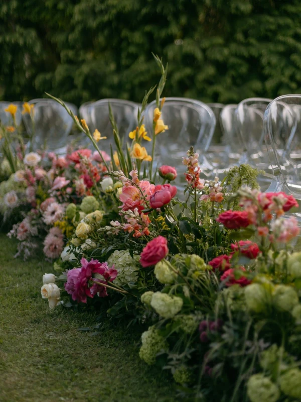 A Hot Pink and Tangerine Wedding of Winding Blooms and Fringe
